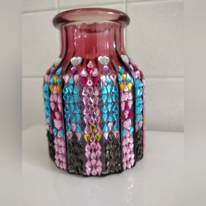 A vase that looks like Church windows